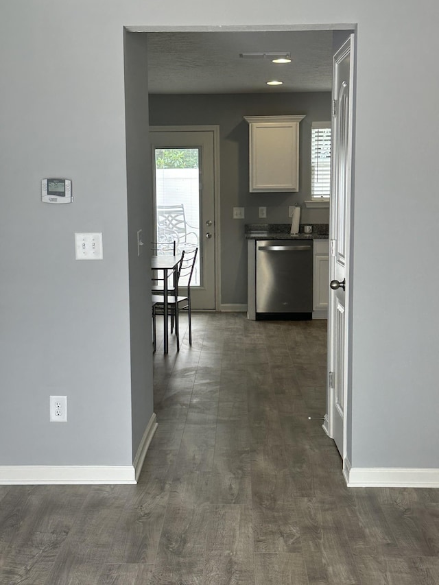 1158 Tradition Trl, Murfreesboro, TN 37130 - kitchen with dishwasher, dark countertops, white cabinets, and baseboards
