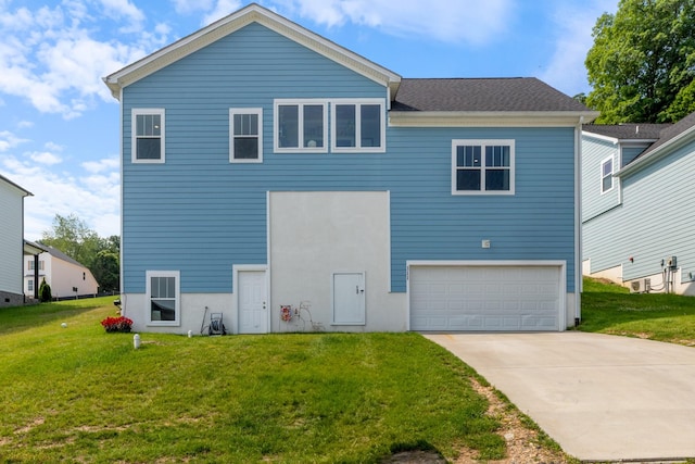 111 Madeleine Way, Kingston Springs, TN 37082 - back of property with a garage, a yard, and concrete driveway