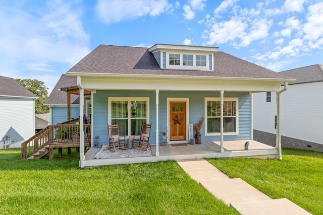 111 Madeleine Way, Kingston Springs, TN 37082 - bungalow-style house with covered porch, a front yard, and roof with shingles
