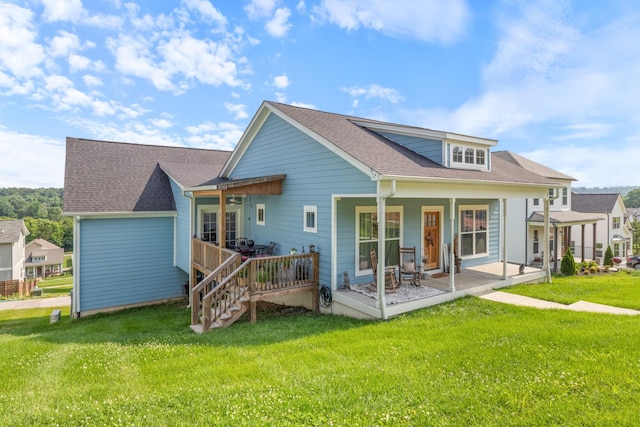 111 Madeleine Way, Kingston Springs, TN 37082 - back of property featuring a yard and a shingled roof