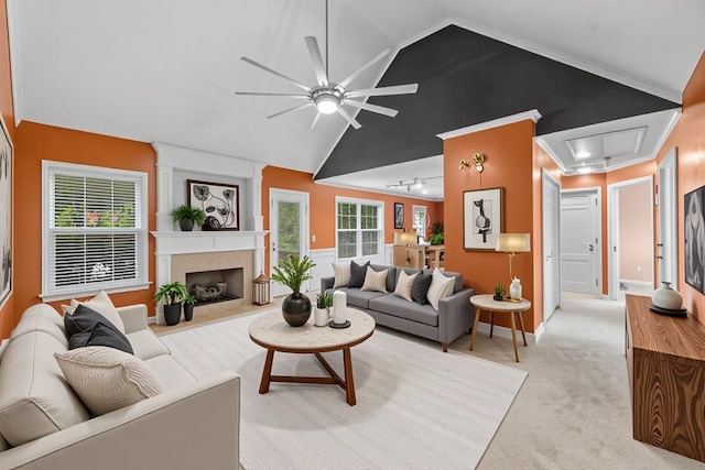 9244 Sedman Rd, Hixson, TN 37343 - living area featuring attic access, vaulted ceiling, ceiling fan, light carpet, and a premium fireplace