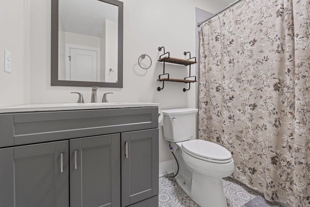 904 Park Crest Ct, Mount Juliet, TN 37122 - full bathroom featuring vanity, toilet, tile patterned flooring, baseboards, and a shower with shower curtain