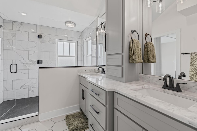 904 Park Crest Ct, Mount Juliet, TN 37122 - bathroom featuring a stall shower, double vanity, tile patterned floors, and baseboards