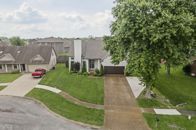 904 Park Crest Ct, Mount Juliet, TN 37122 - view of front of home featuring driveway, a chimney, a front yard, and an attached garage