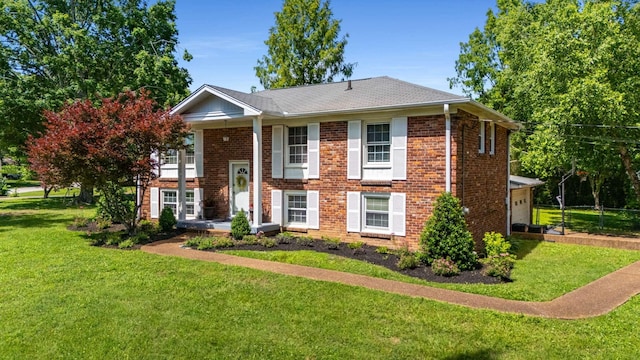 604 Meadowgreen Dr, Franklin, TN 37069 - view of front facade with a front yard and brick siding