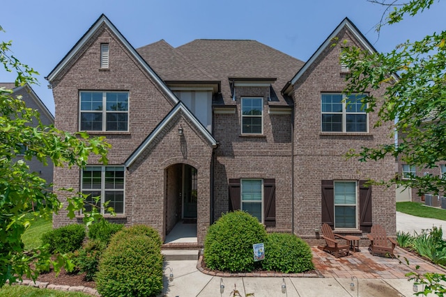 705 Rain Meadow Ct, Spring Hill, TN 37174 - view of front facade with a patio and brick siding