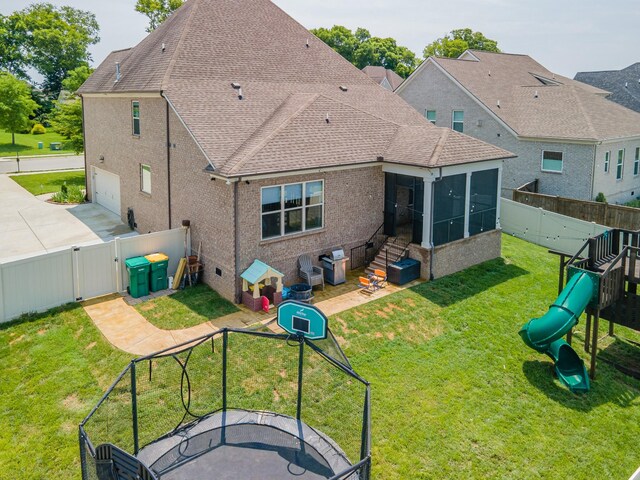 705 Rain Meadow Ct, Spring Hill, TN 37174 - rear view of house featuring a gate, a sunroom, a shingled roof, and a fenced backyard