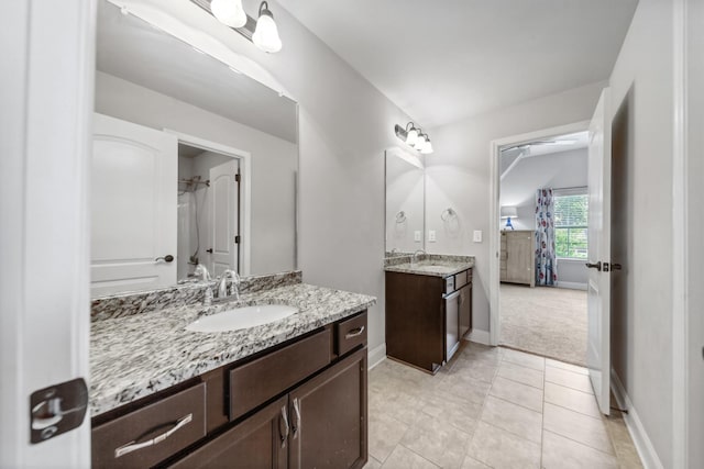 705 Rain Meadow Ct, Spring Hill, TN 37174 - bathroom with two vanities and tile patterned flooring
