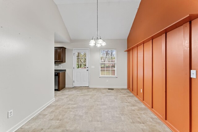 1090 Sugarberry Ln, Springfield, TN 37172 - unfurnished dining area featuring a chandelier, baseboards, and high vaulted ceiling