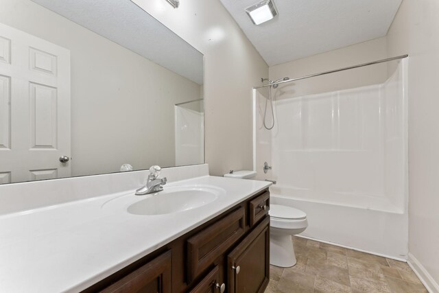 1090 Sugarberry Ln, Springfield, TN 37172 - bathroom with toilet, vanity,  shower combination, stone finish flooring, and baseboards