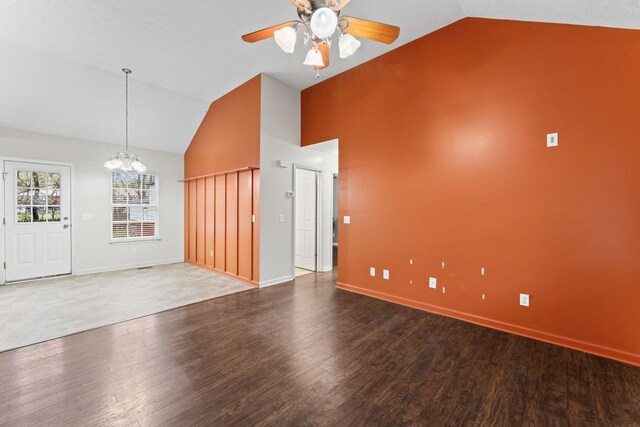 1090 Sugarberry Ln, Springfield, TN 37172 - unfurnished living room featuring a chandelier, a ceiling fan, high vaulted ceiling, wood finished floors, and baseboards