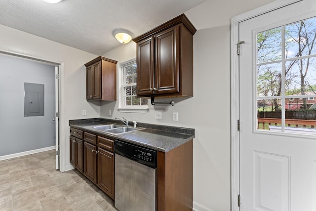 1090 Sugarberry Ln, Springfield, TN 37172 - kitchen with dishwasher, a sink, dark countertops, electric panel, and baseboards