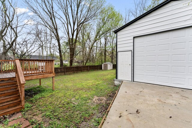 1090 Sugarberry Ln, Springfield, TN 37172 - view of yard featuring a wooden deck, a garage, and stairs