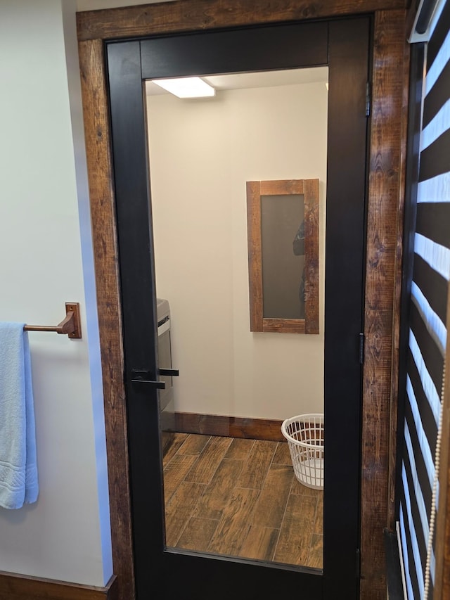 371 Leader Dr, New Johnsonville, TN 37134 - bathroom featuring baseboards and wood finished floors