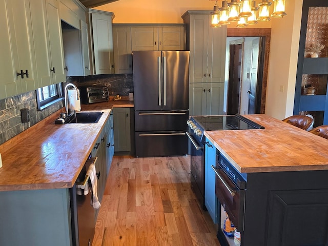 371 Leader Dr, New Johnsonville, TN 37134 - kitchen with high end refrigerator, butcher block counters, electric range, light wood-type flooring, and backsplash