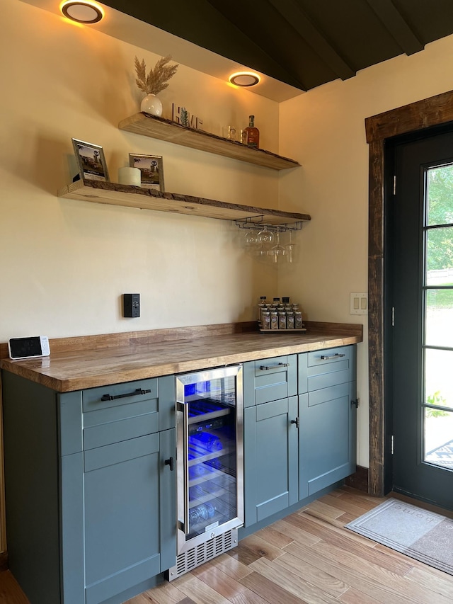 371 Leader Dr, New Johnsonville, TN 37134 - indoor dry bar with beverage cooler and light wood finished floors