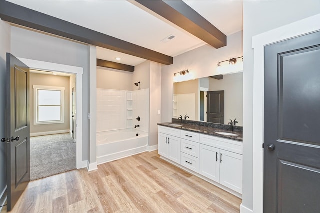 796 N Leath Rd, Portland, TN 37148 - full bathroom with double vanity, beamed ceiling, wood finished floors, shower / tub combination, and baseboards