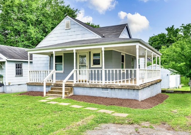 5306 Michigan Ave, Nashville, TN 37209 - view of front of home featuring roof with shingles, a porch, and a front lawn
