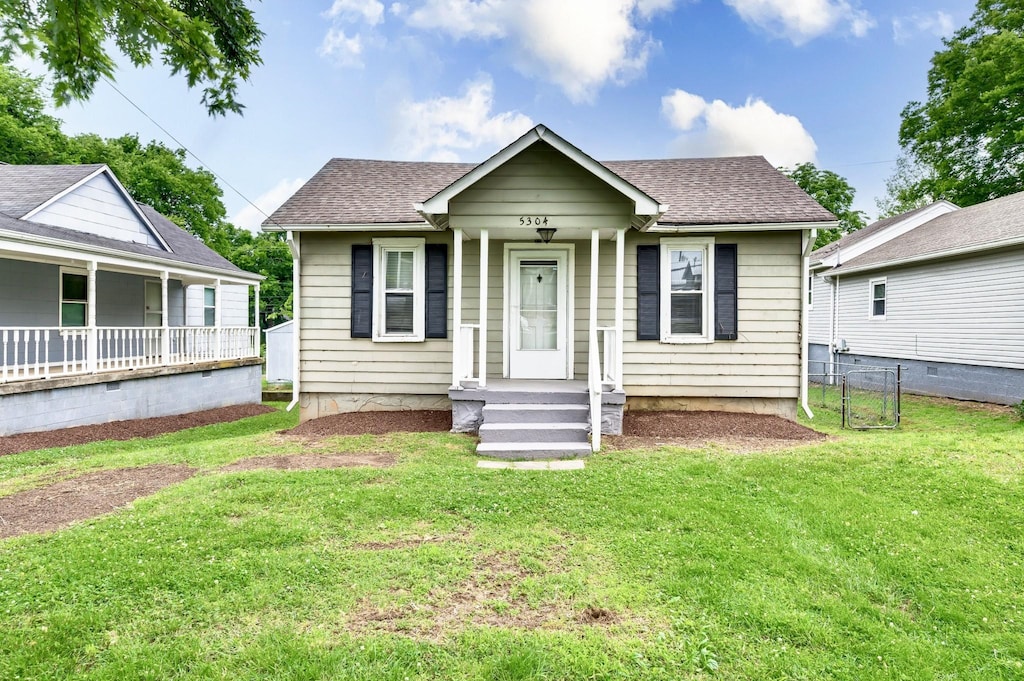 5304 Michigan Ave, Nashville, TN 37209 - bungalow-style home with a porch and roof with shingles