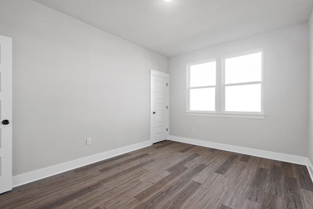 2416 Burton Dr, White House, TN 37188 - unfurnished room featuring dark wood-type flooring and baseboards
