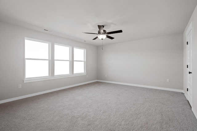 2416 Burton Dr, White House, TN 37188 - spare room with a ceiling fan, baseboards, and carpet flooring