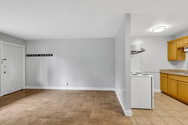 2134 Fairfax Ave Unit A1, Nashville, TN 37212 - kitchen with electric stove, a sink, light countertops, and baseboards