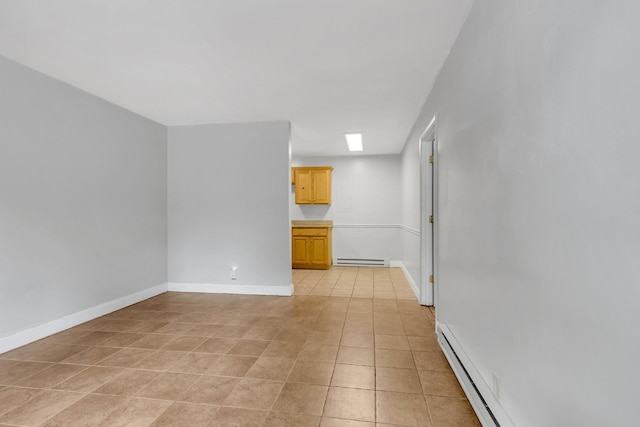 2134 Fairfax Ave Unit A1, Nashville, TN 37212 - unfurnished room with a baseboard heating unit, light tile patterned flooring, a baseboard radiator, and baseboards