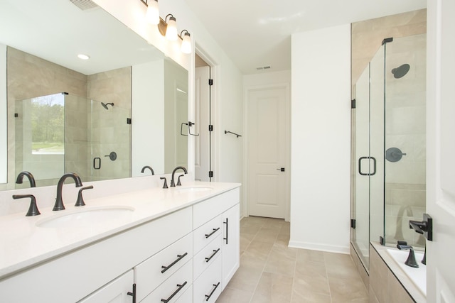2367 Williamsport Lndg, Columbia, TN 38401 - full bathroom featuring a stall shower, double vanity, tile patterned floors, a tub to relax in, and recessed lighting