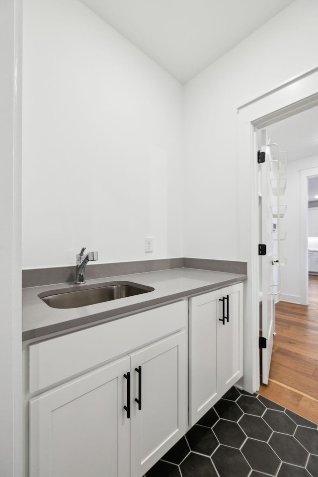 3298 Vinemont Dr, Thompsons Station, TN 37179 - bar featuring a sink and dark wood finished floors
