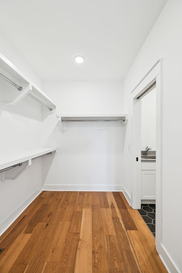 3298 Vinemont Dr, Thompsons Station, TN 37179 - walk in closet featuring wood finished floors