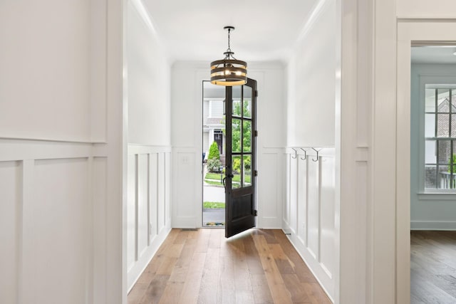 3298 Vinemont Dr, Thompsons Station, TN 37179 - entrance foyer featuring a decorative wall, a chandelier, hardwood / wood-style flooring, and a wainscoted wall