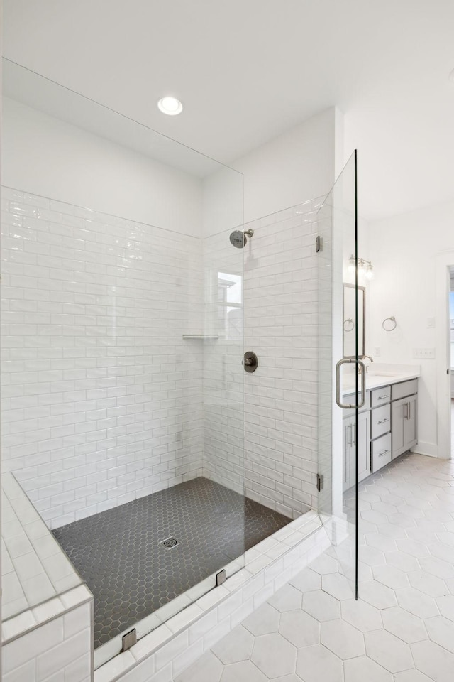 3298 Vinemont Dr, Thompsons Station, TN 37179 - bathroom with a stall shower, vanity, tile patterned floors, and recessed lighting