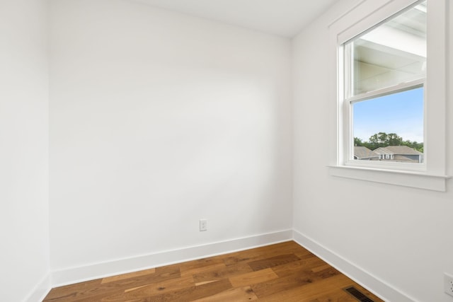 3298 Vinemont Dr, Thompsons Station, TN 37179 - spare room with baseboards and wood finished floors