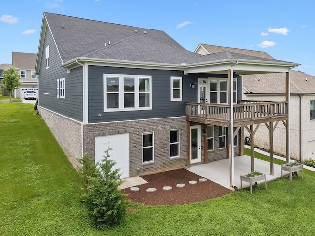 3298 Vinemont Dr, Thompsons Station, TN 37179 - rear view of house with a patio area, a yard, brick siding, a deck, and roof with shingles