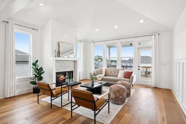 3298 Vinemont Dr, Thompsons Station, TN 37179 - living room featuring plenty of natural light, a fireplace, hardwood / wood-style floors, high vaulted ceiling, and recessed lighting