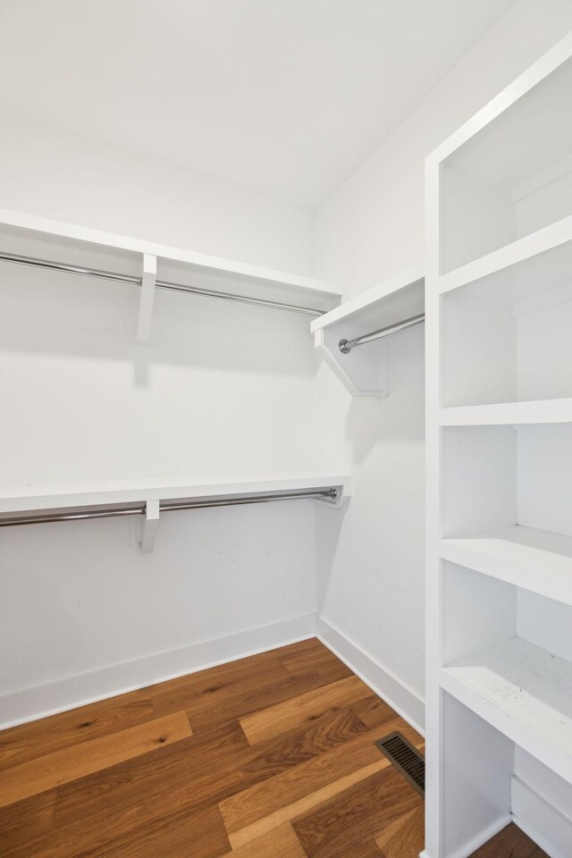3298 Vinemont Dr, Thompsons Station, TN 37179 - walk in closet with wood finished floors
