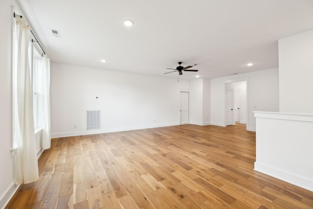3298 Vinemont Dr, Thompsons Station, TN 37179 - unfurnished room with a ceiling fan, light wood-style flooring, recessed lighting, and baseboards