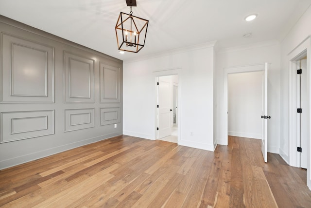 3298 Vinemont Dr, Thompsons Station, TN 37179 - unfurnished bedroom with a chandelier, light wood-type flooring, ornamental molding, baseboards, and recessed lighting