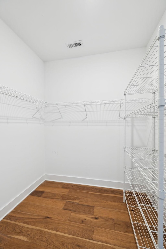3298 Vinemont Dr, Thompsons Station, TN 37179 - walk in closet featuring wood finished floors