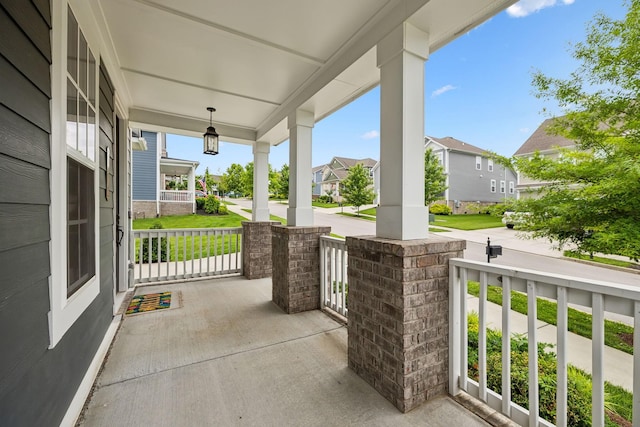 3298 Vinemont Dr, Thompsons Station, TN 37179 - covered porch with a residential view