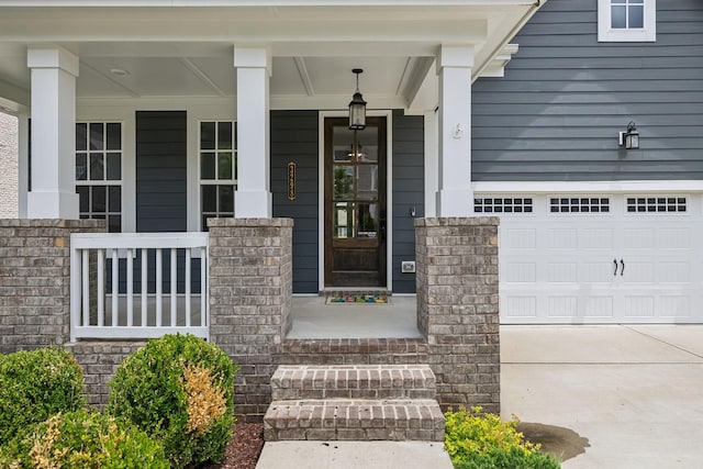 3298 Vinemont Dr, Thompsons Station, TN 37179 - doorway to property with covered porch and concrete driveway