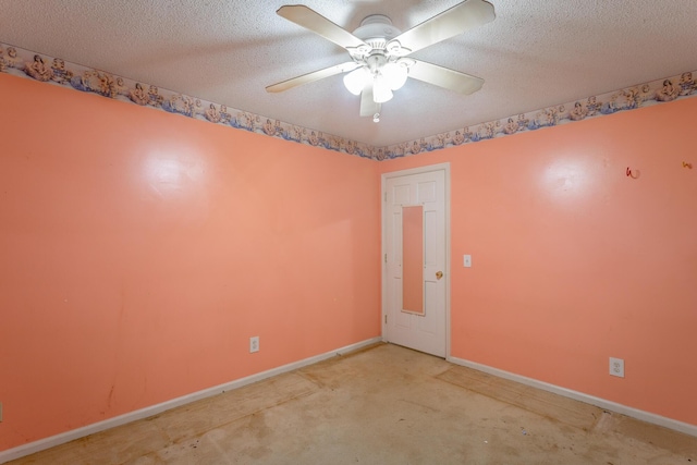 4510 Ravenwood Dr E, Chattanooga, TN 37415 - spare room featuring baseboards, a textured ceiling, ceiling fan, and concrete flooring