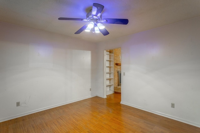 4510 Ravenwood Dr E, Chattanooga, TN 37415 - unfurnished room with ceiling fan, baseboards, and light wood-style flooring
