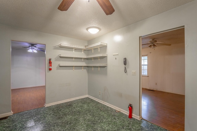 4510 Ravenwood Dr E, Chattanooga, TN 37415 - unfurnished room featuring a ceiling fan, a textured ceiling, wood finished floors, and baseboards