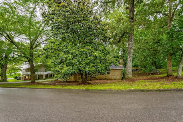 4510 Ravenwood Dr E, Chattanooga, TN 37415 - view of property hidden behind natural elements featuring crawl space
