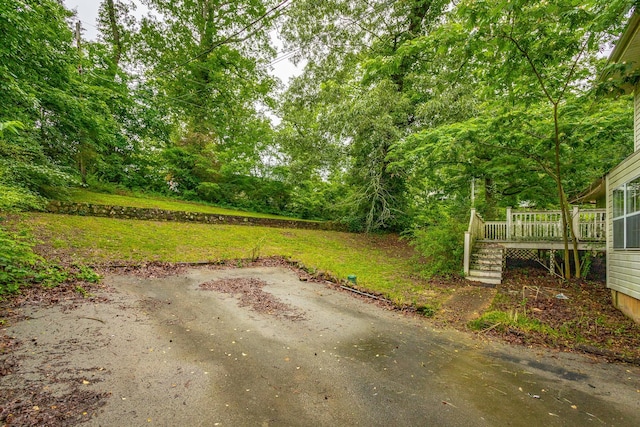 4510 Ravenwood Dr E, Chattanooga, TN 37415 - view of yard featuring a wooden deck, a patio, and stairs