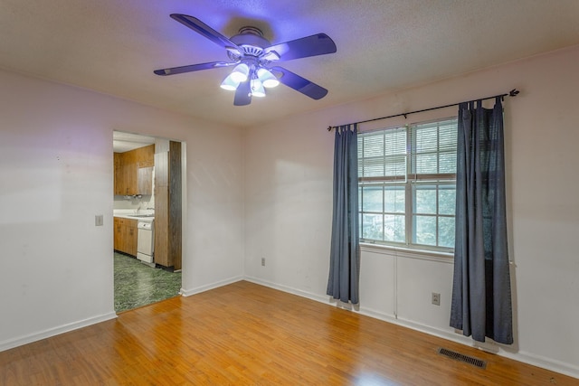 4510 Ravenwood Dr E, Chattanooga, TN 37415 - empty room featuring ceiling fan, light wood-style flooring, and baseboards