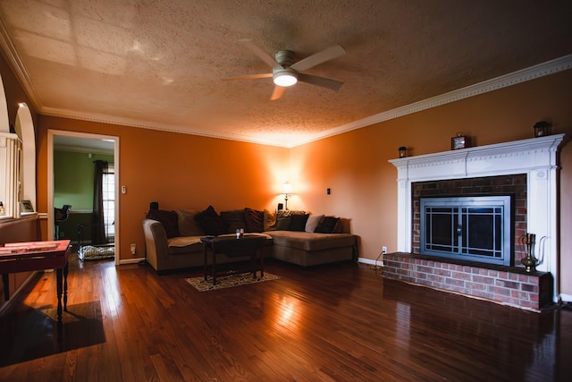 2014 Saddlebrook Dr, Murfreesboro, TN 37129 - living area with a ceiling fan, wood finished floors, a textured ceiling, a fireplace, and crown molding