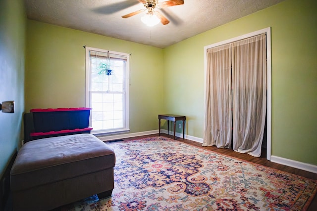 2014 Saddlebrook Dr, Murfreesboro, TN 37129 - living area featuring a ceiling fan, wood finished floors, and a textured ceiling