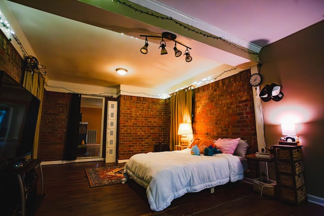 2014 Saddlebrook Dr, Murfreesboro, TN 37129 - bedroom with brick wall and wood finished floors